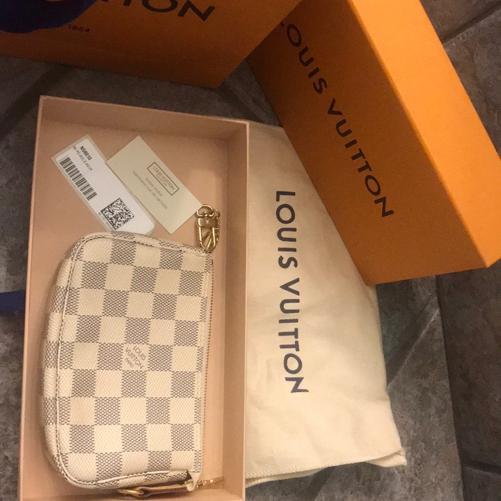 Authentic Louis Vuitton Mini Pochette / Azur
